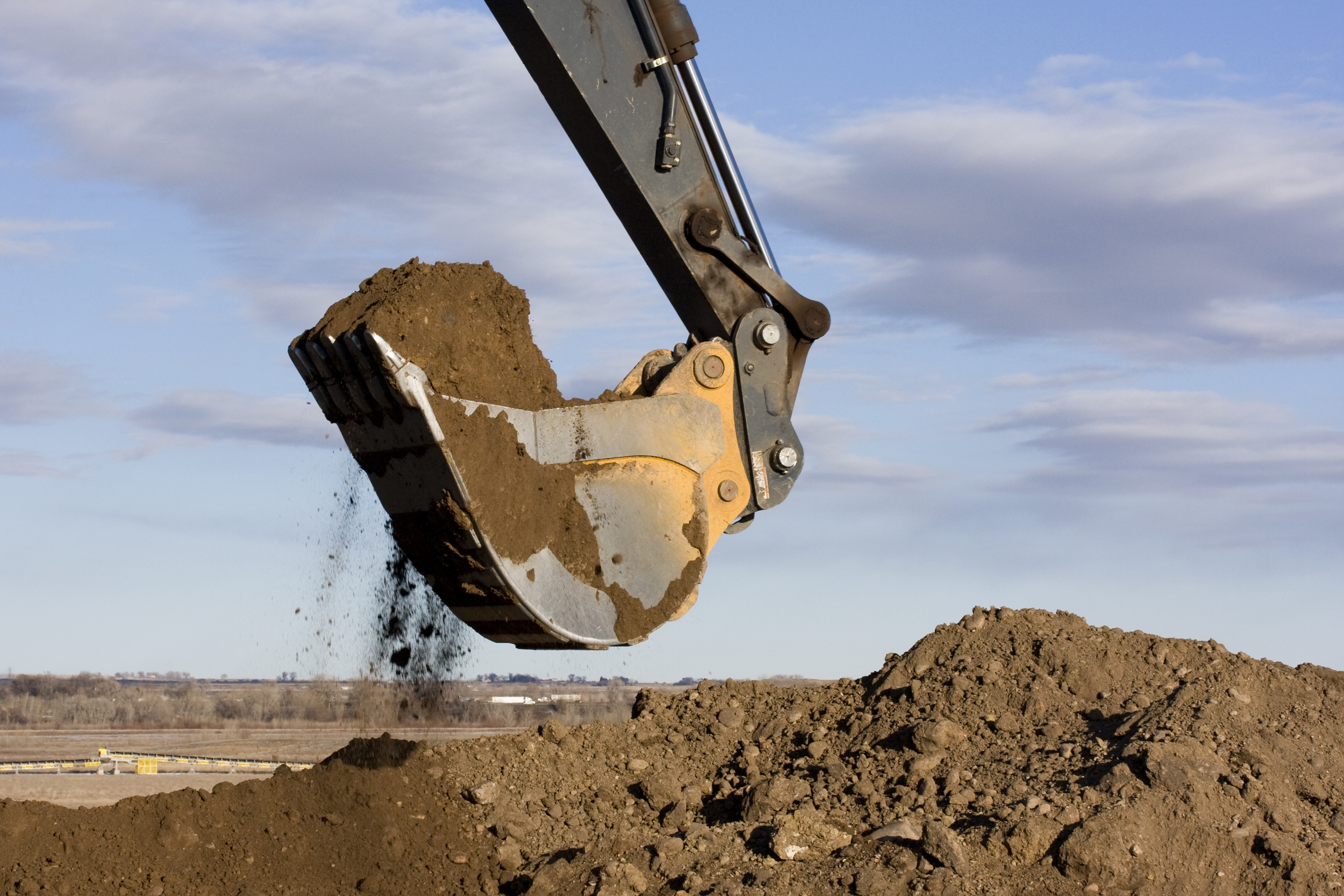 bigstock-Excavator-Arm-And-Scoop-Diggin-3414665